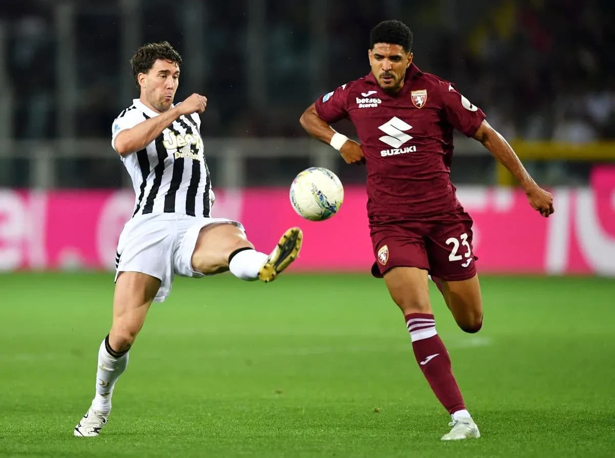 Player kicking ball during Torino vs Juventus match