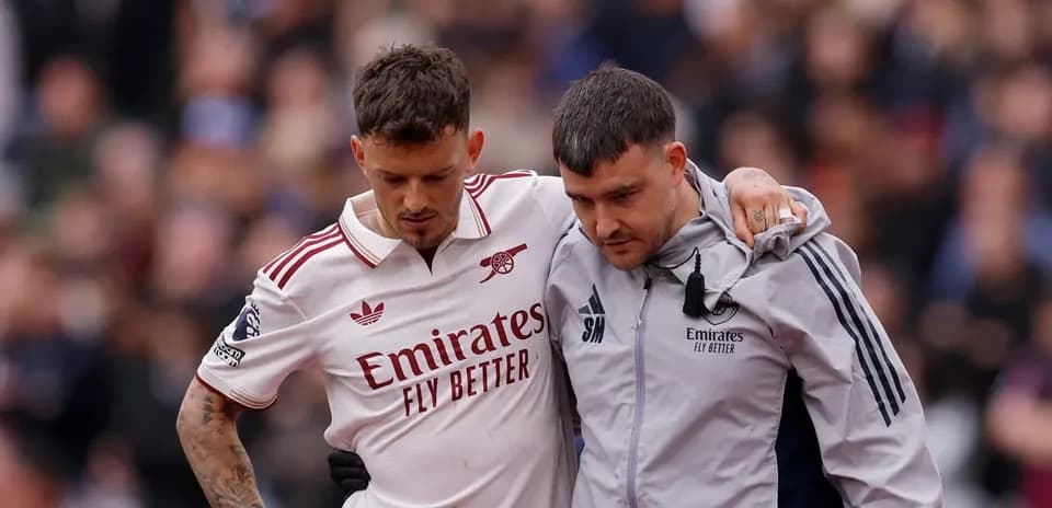 Player assisted off the field during match