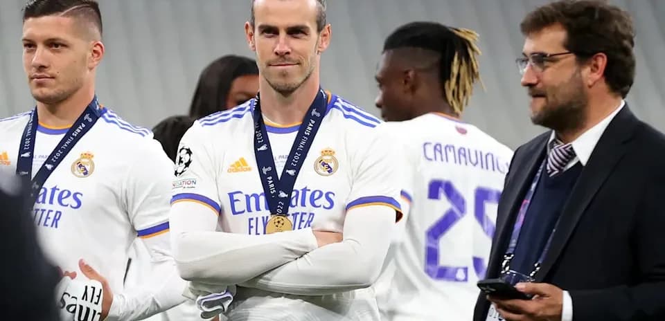 Real Madrid players with medals at trophy presentation