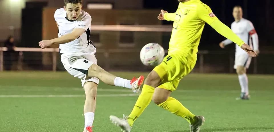 Player shooting on goal during SC St. Tönis match