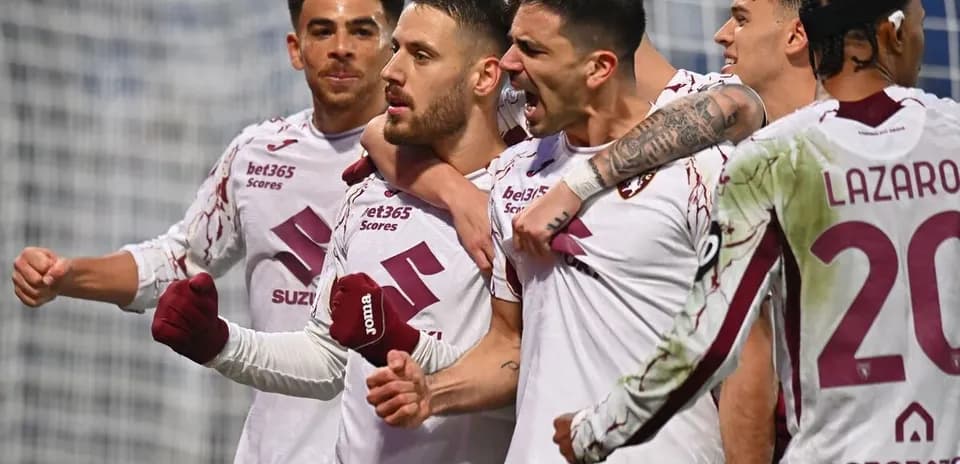 Torino players celebrating a goal during match
