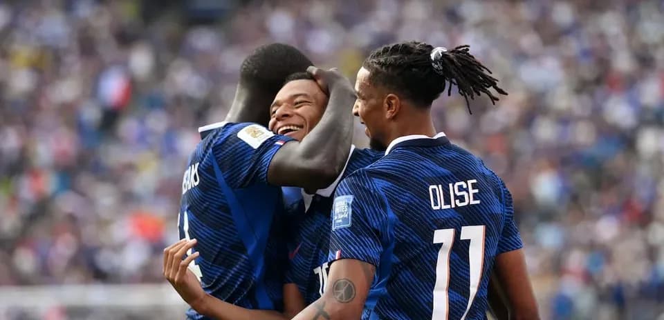 French players celebrating a goal on the field