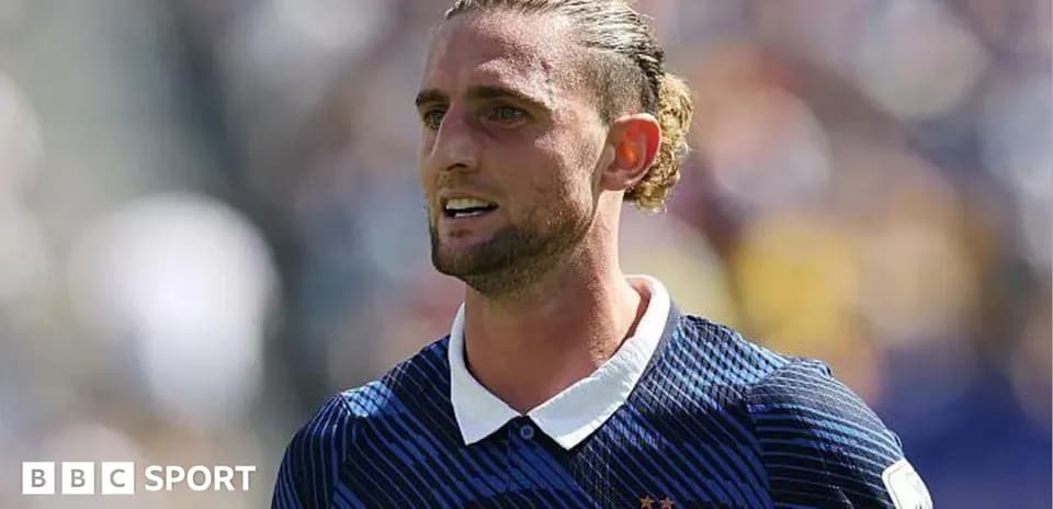 Player in France kit during match action