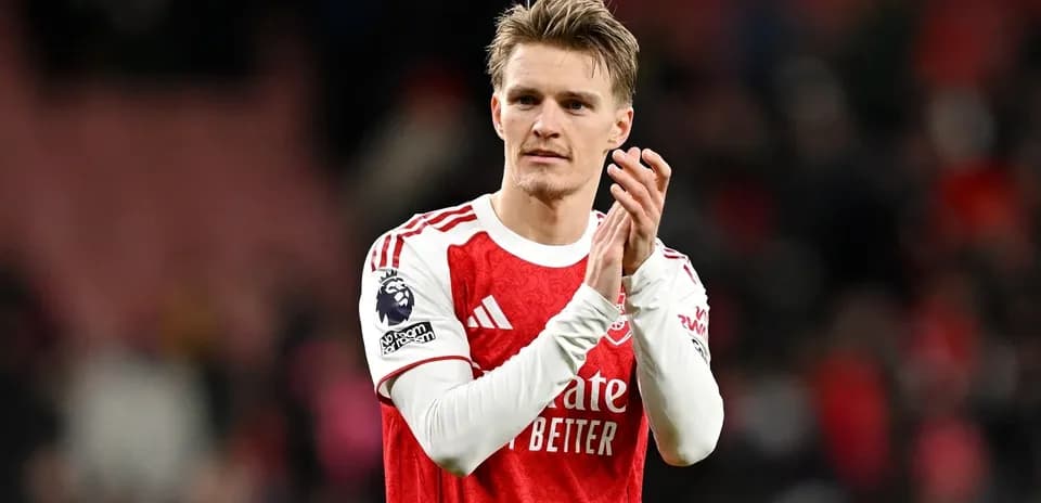 Player applauding fans after the match