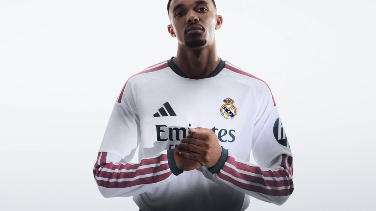 Player wearing Real Madrid jersey with hands clasped