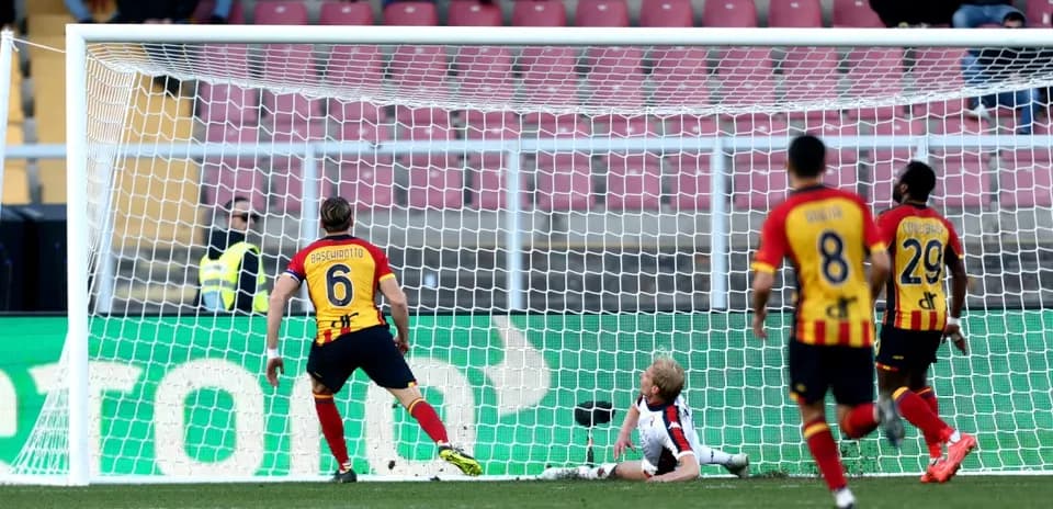 Goalkeeper making a save during Lecce match