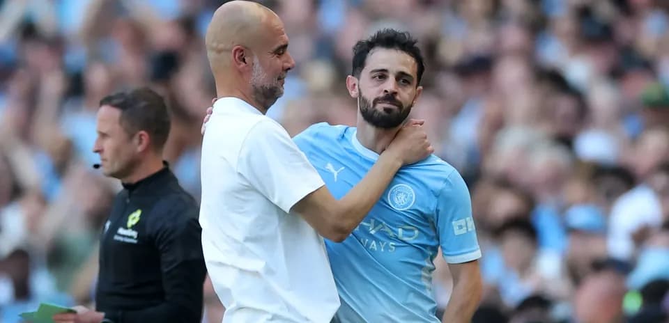 Pep Guardiola embraces Bernardo Silva during match