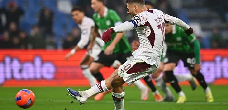 Player taking a penalty kick during Serie A match