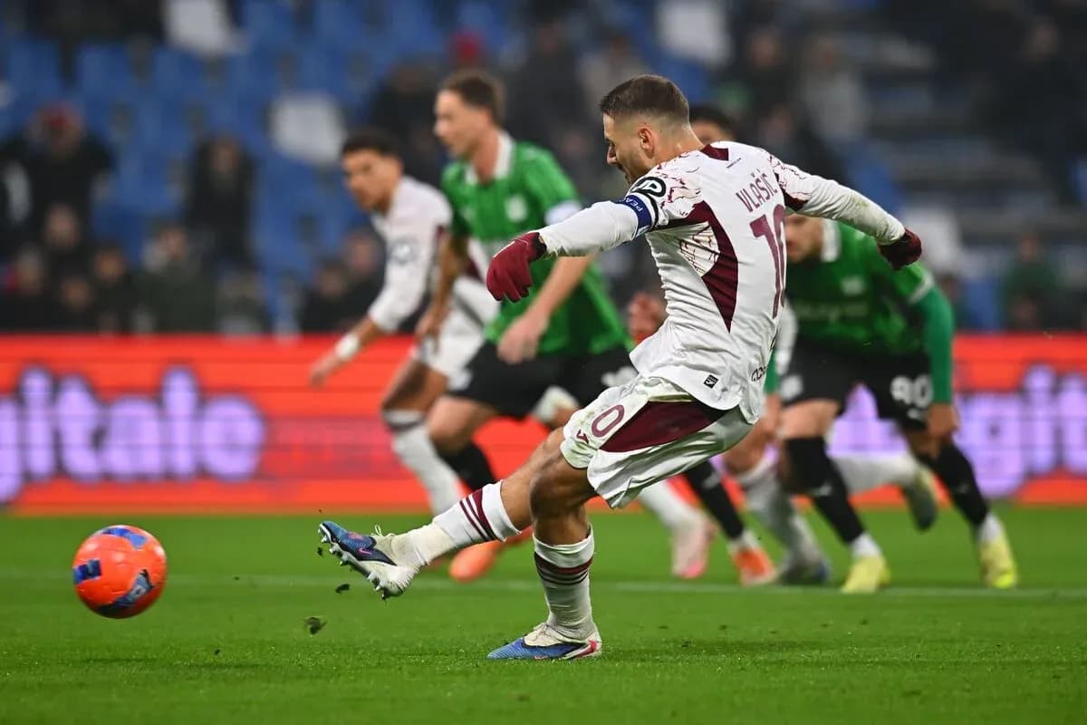 Player taking a penalty kick during Serie A match