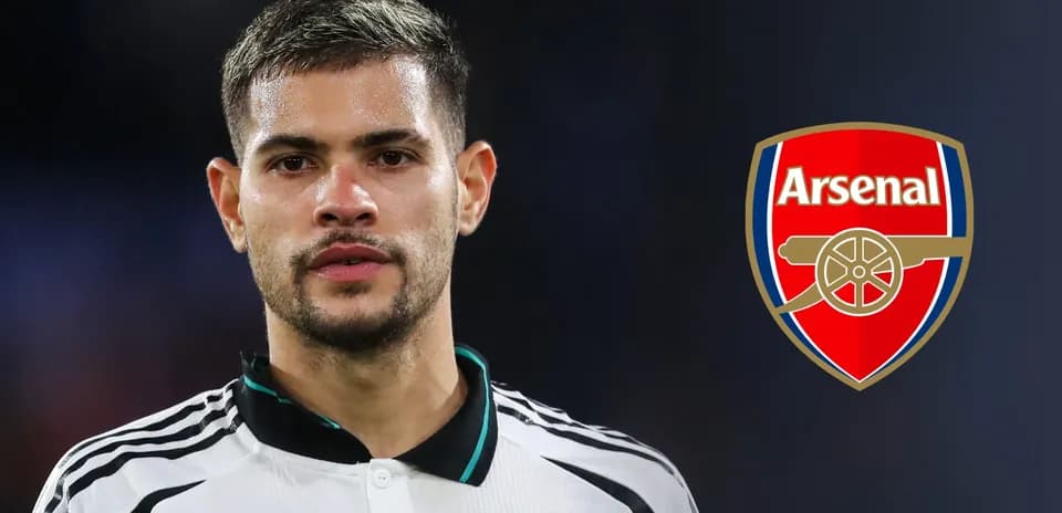 Player in Arsenal kit with club logo background