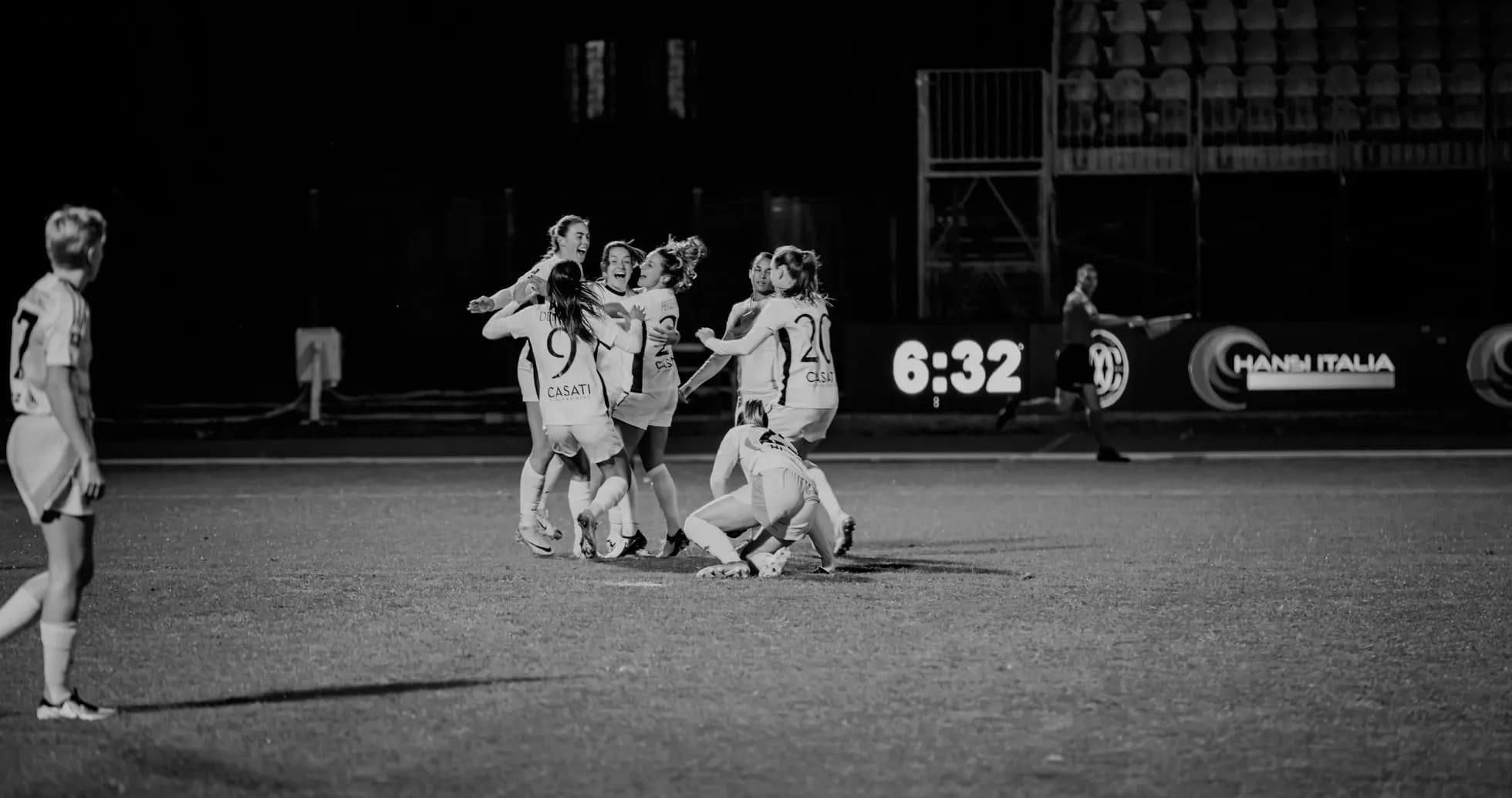 Celebration after a goal in women's football match