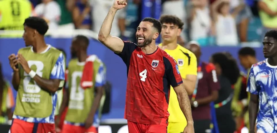 Player celebrating victory after match in stadium