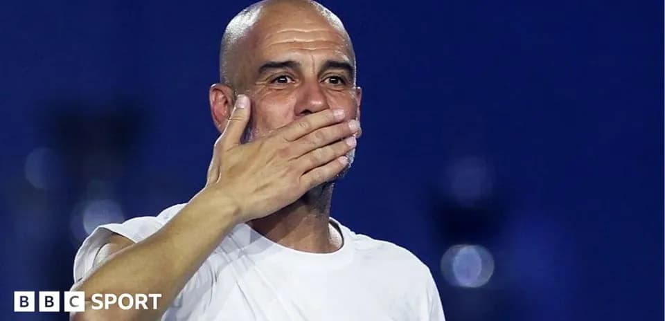 Coach gesturing during a post-match celebration