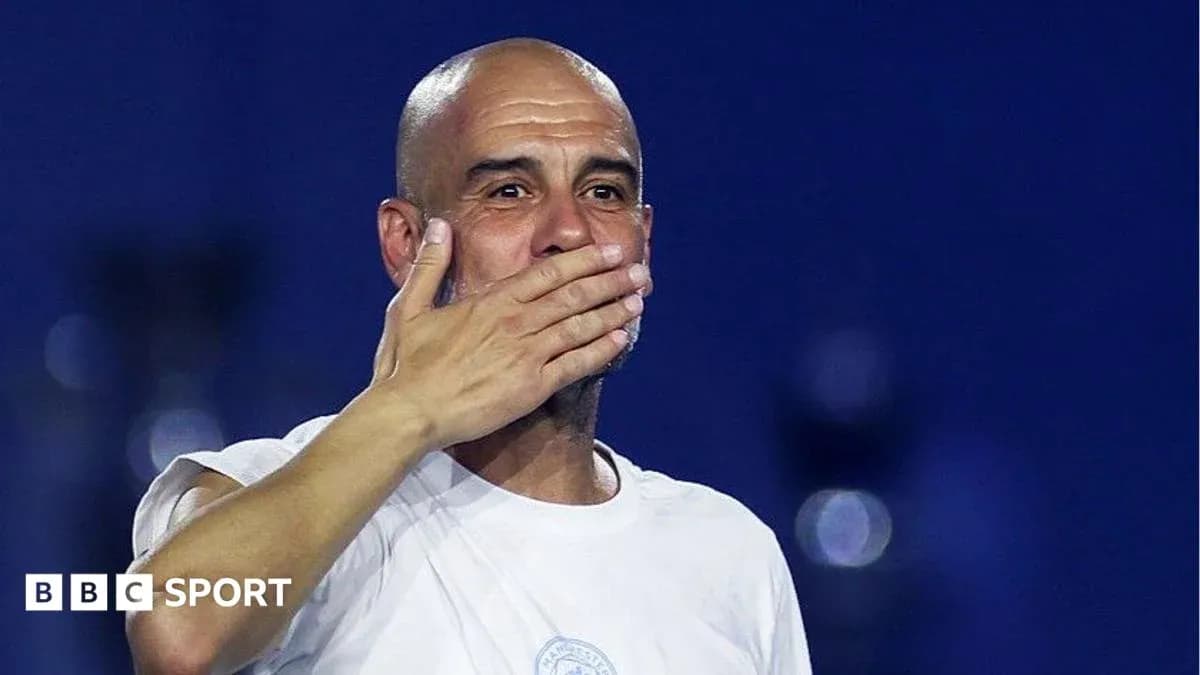 Coach gesturing during a post-match celebration