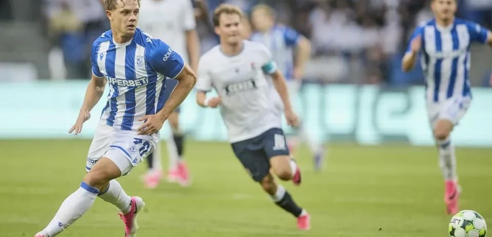 Lech Poznan player dribbling during match