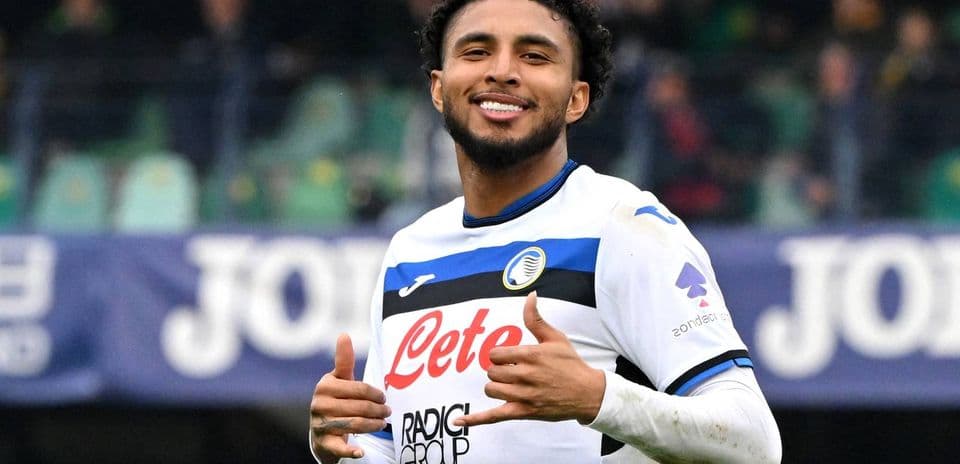 Player celebrating with thumbs up on the field