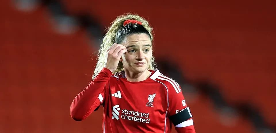 Player in red Liverpool kit during a match