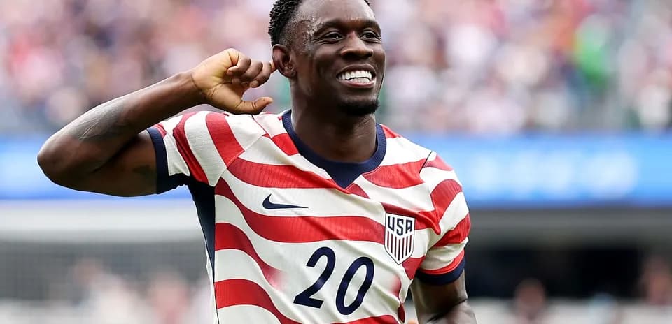 Player celebrating in USA jersey during match