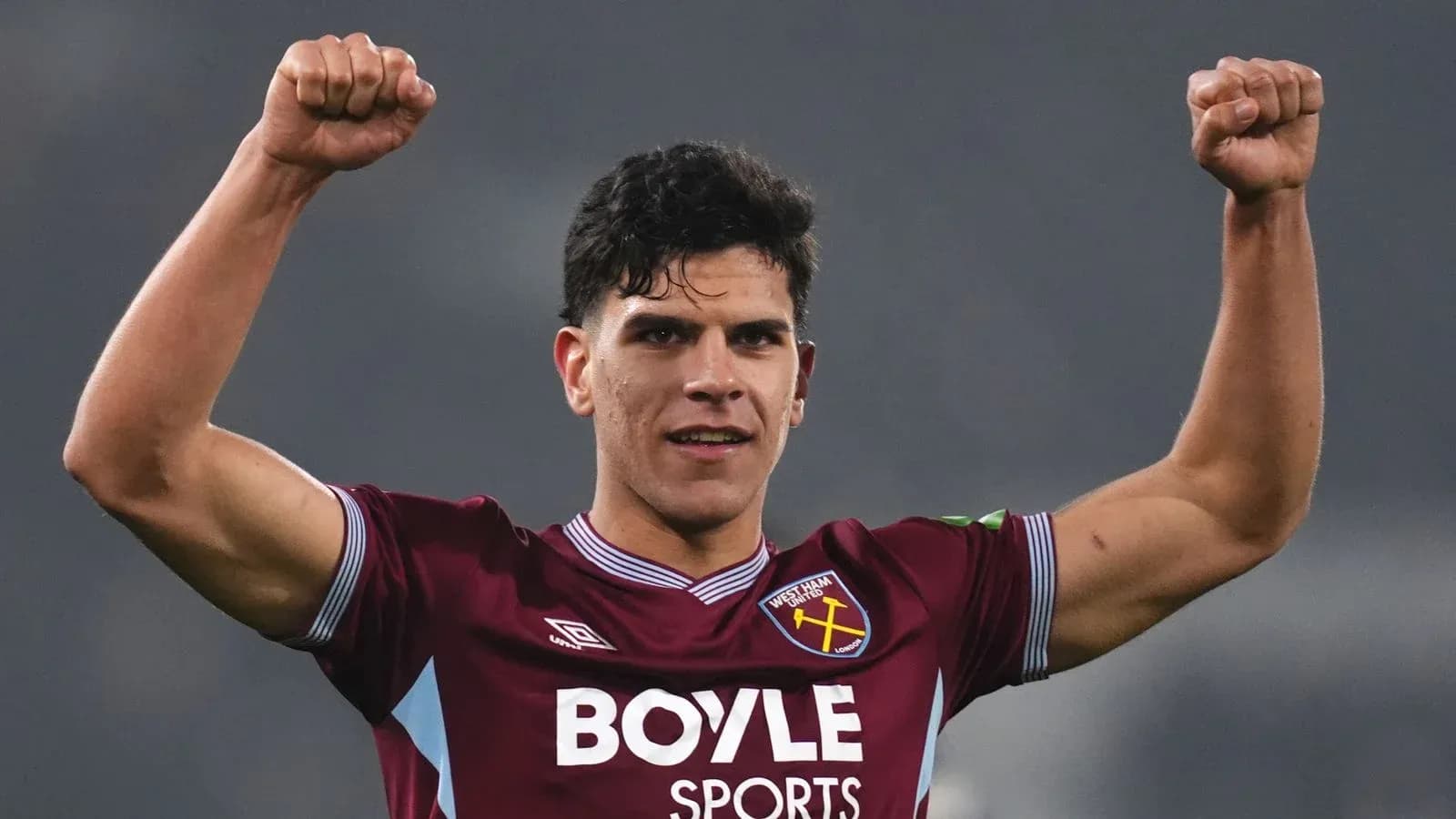 Player celebrating victory with raised fists
