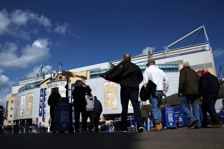 Fans walking towards Chelsea FC stadium entrance