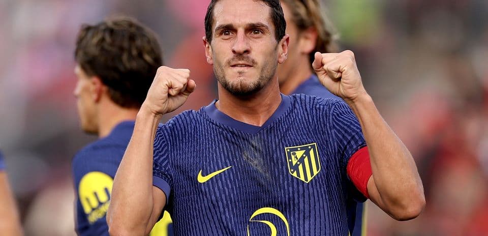 Player celebrating after scoring for Atletico Madrid