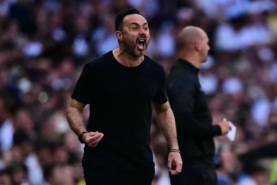 Coach shouting instructions on the sidelines during match