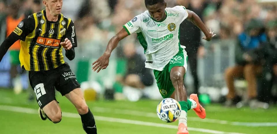 Player dribbling the ball during competitive match