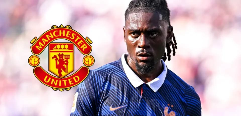 Player in France jersey with Manchester United logo