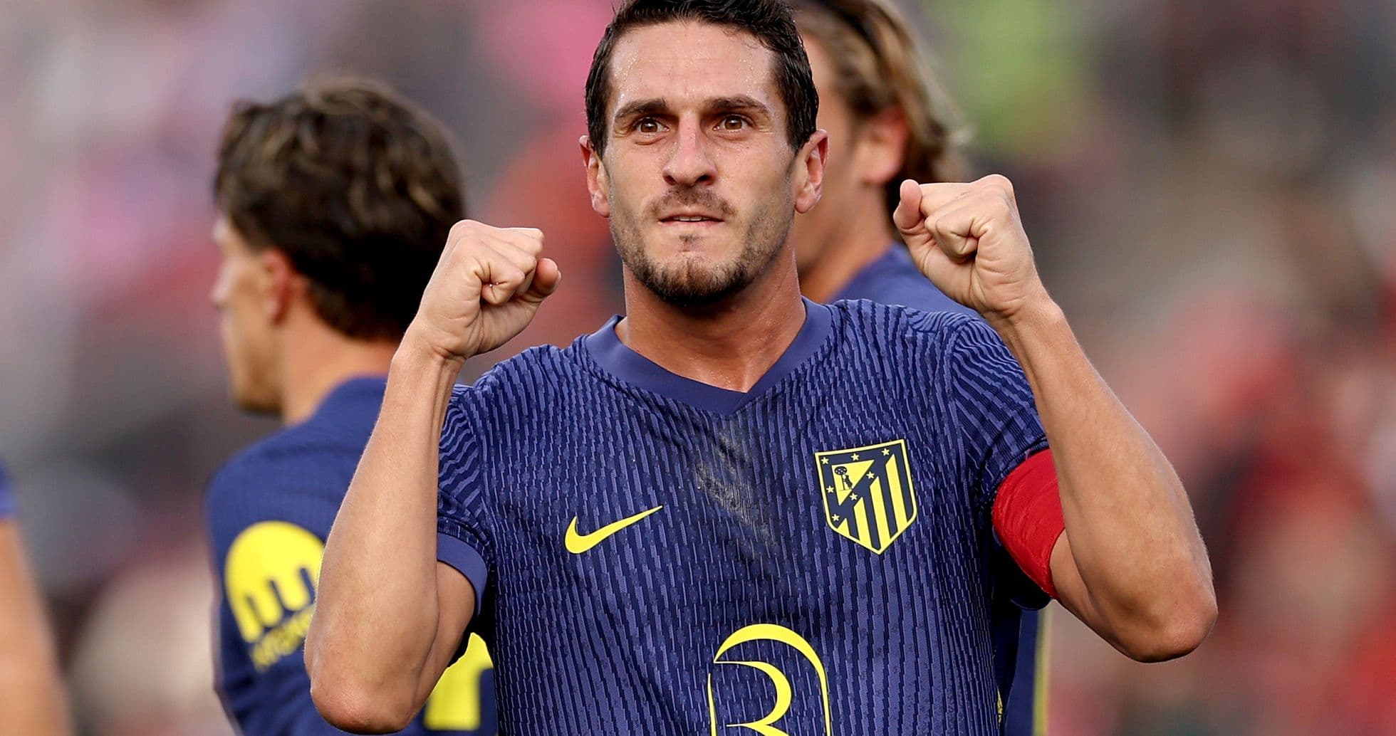 Atletico Madrid player celebrating a victory