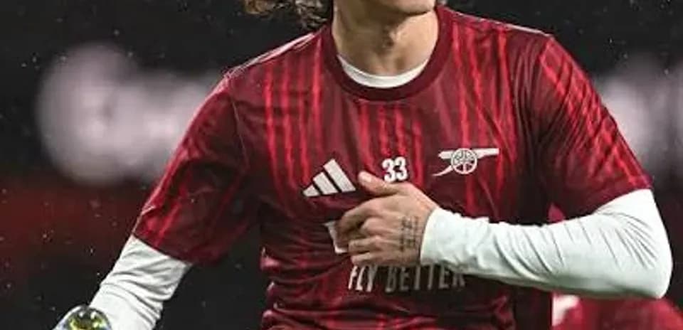 Player stretching on the field during warm-up
