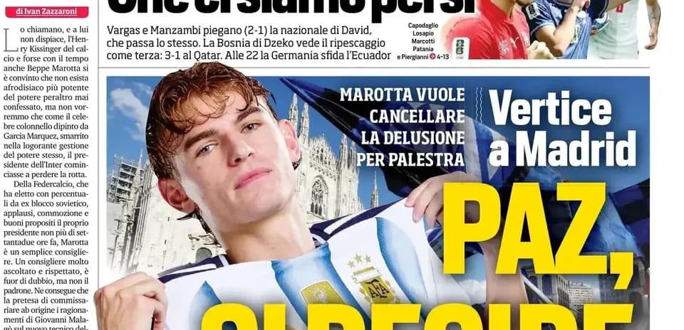 Football player posing in Argentina jersey with city background