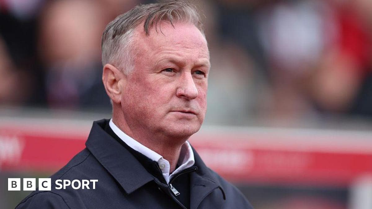 Manager observing match from the sidelines