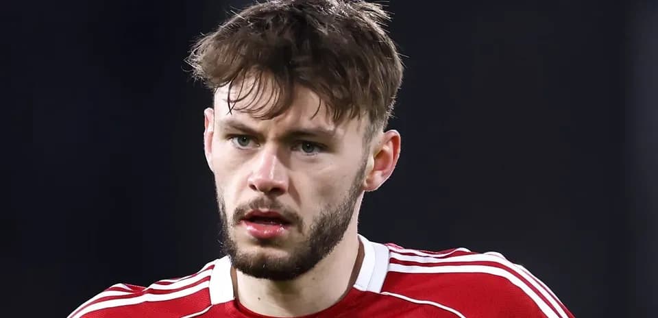 Player in red jersey during match close-up