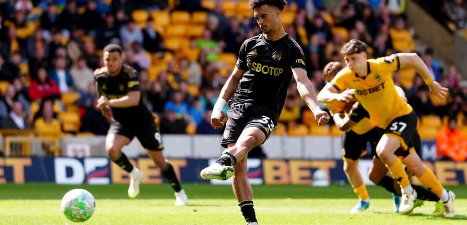 Wolves player taking a penalty kick