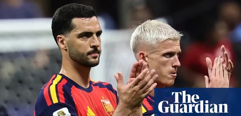 Two Spanish players applauding fans after match