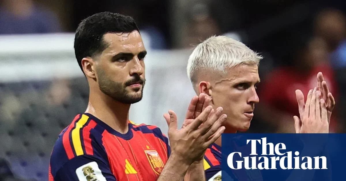 Two Spanish players applauding fans after match