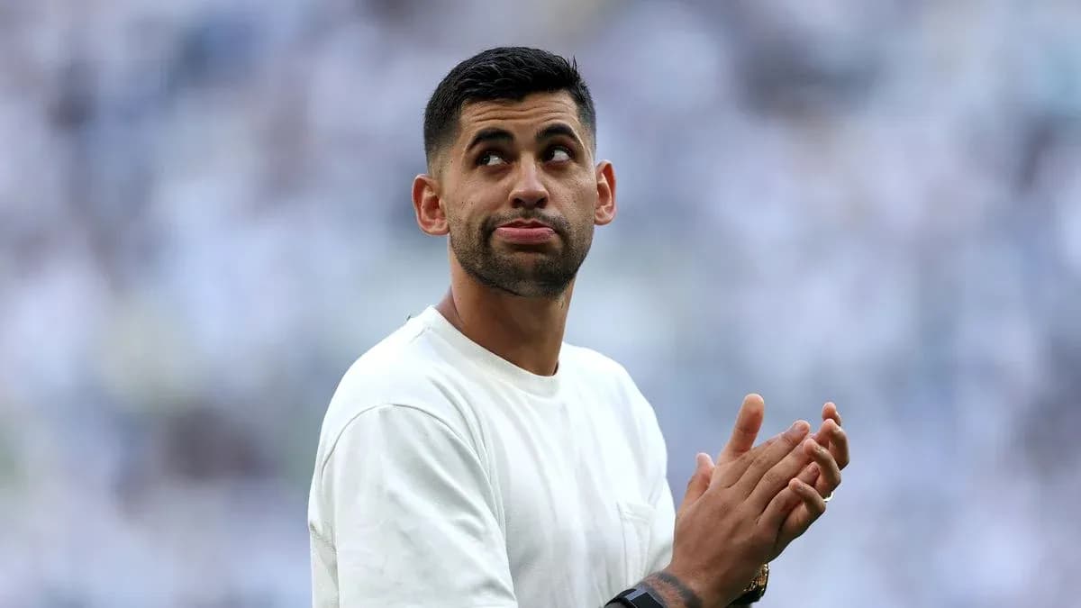 Player clapping during match warm-up on field