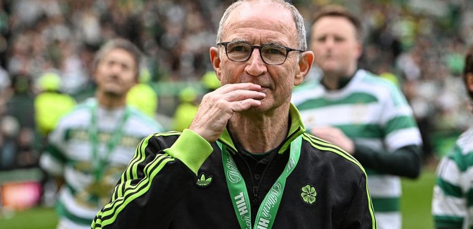 Celtic manager on pitch during post-match celebration