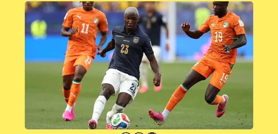 Player dribbling the ball surrounded by opponents
