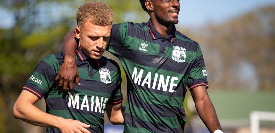 Portland Hearts of Pine players celebrating together