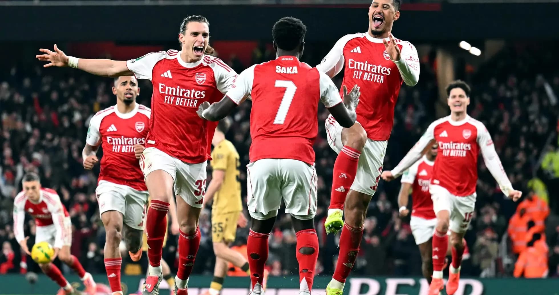Arsenal players celebrating a goal in match