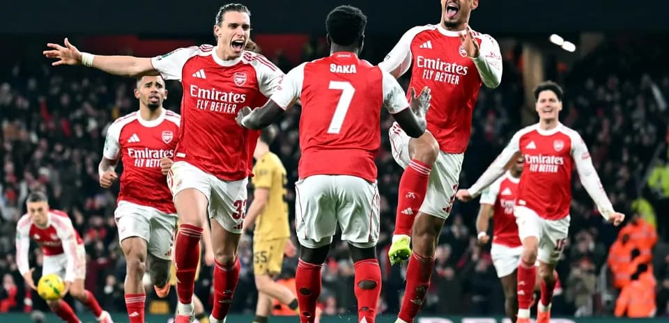 Arsenal players celebrating a goal in match