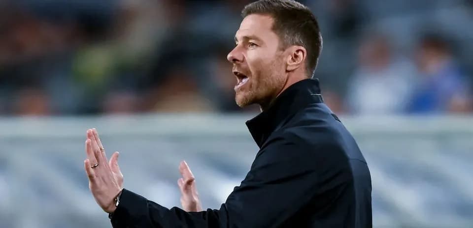 Coach gesturing during match from the sidelines
