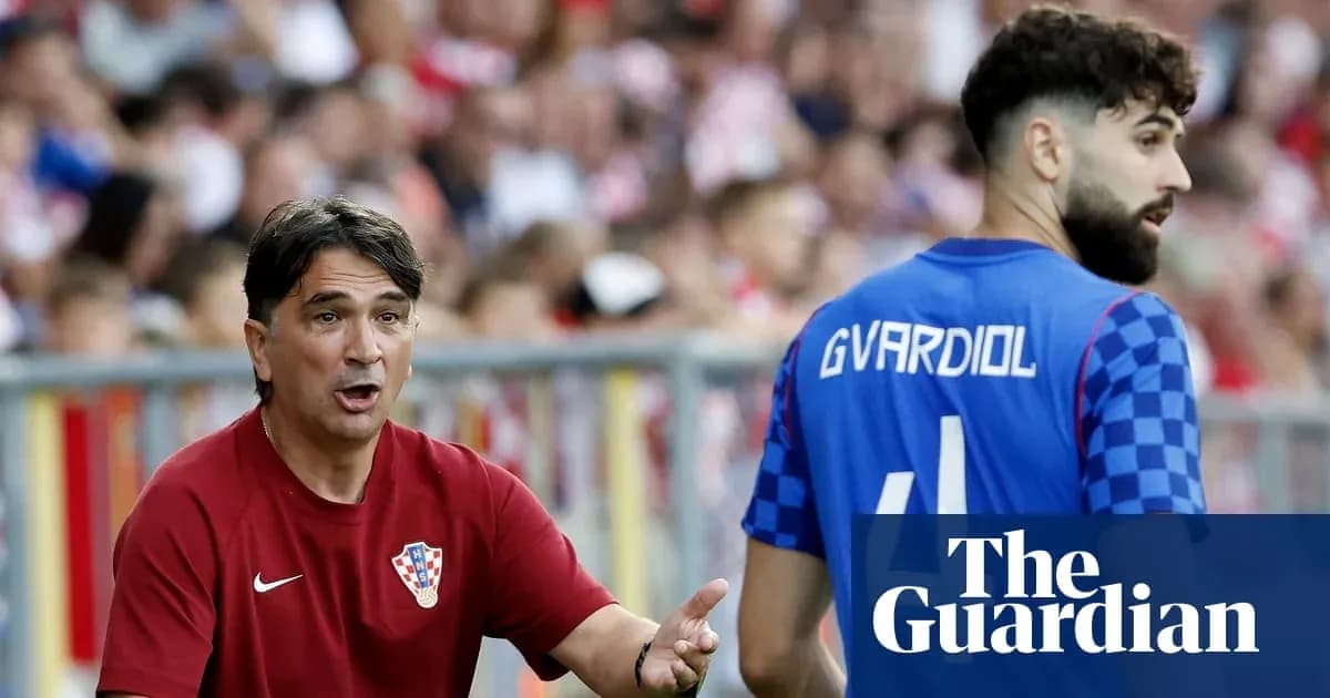 Croatian coach instructing player during match
