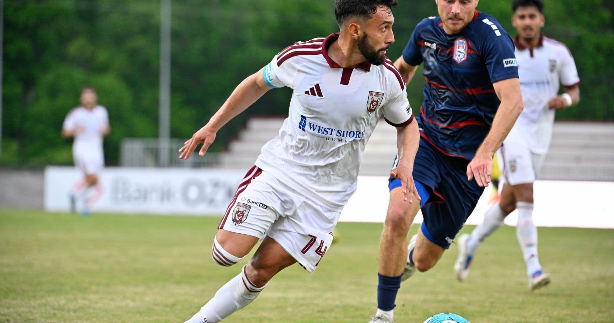One Knoxville player dribbling against Chattanooga Red Wolves