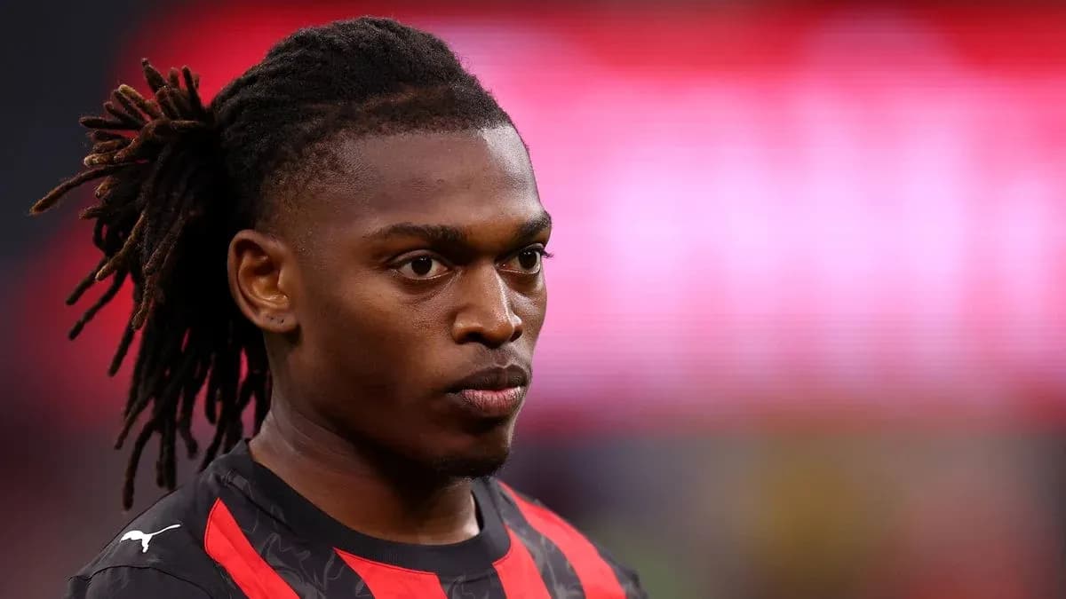 Player with dreadlocks in team jersey on field