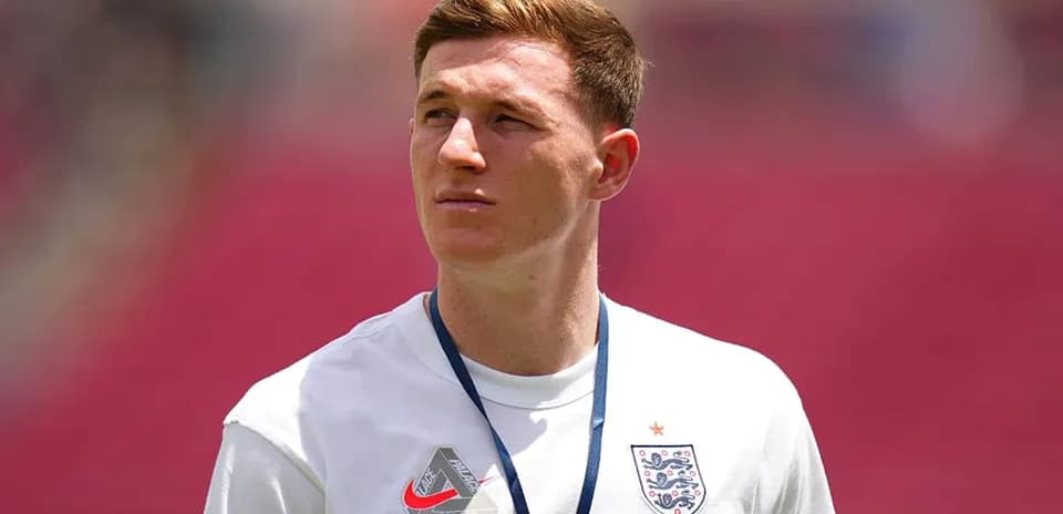 Player in England kit observing the field