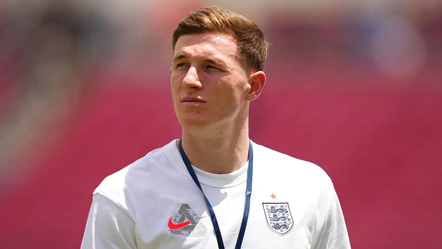 Player in England kit observing the field