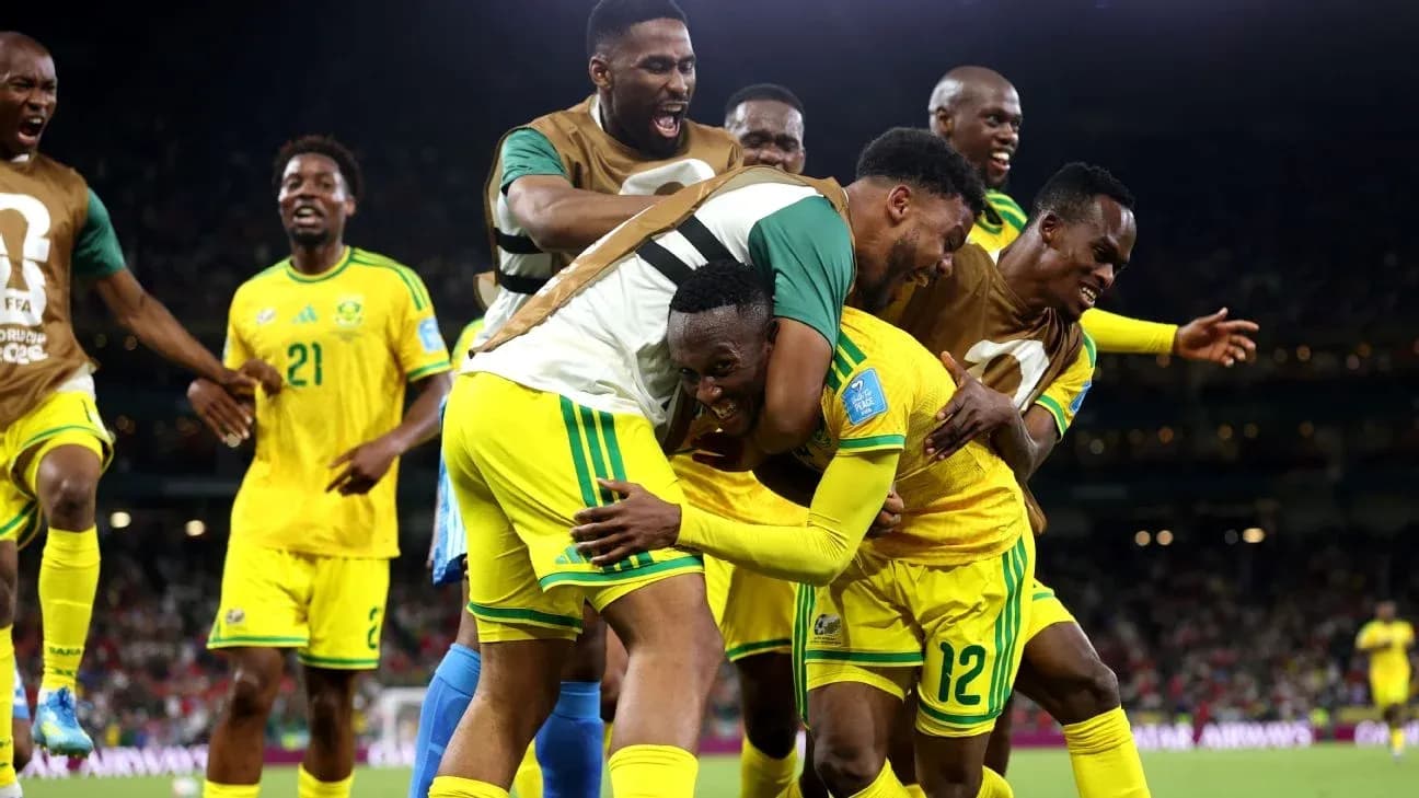 Players celebrating a goal in a match