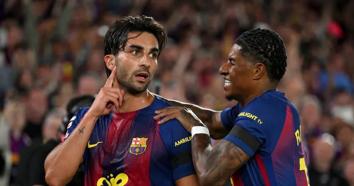 Barcelona players celebrating a goal on the pitch